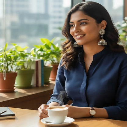 Sunburst Dome Jhumkas with Ghungroo | Antique Silver-Finish Earrings
